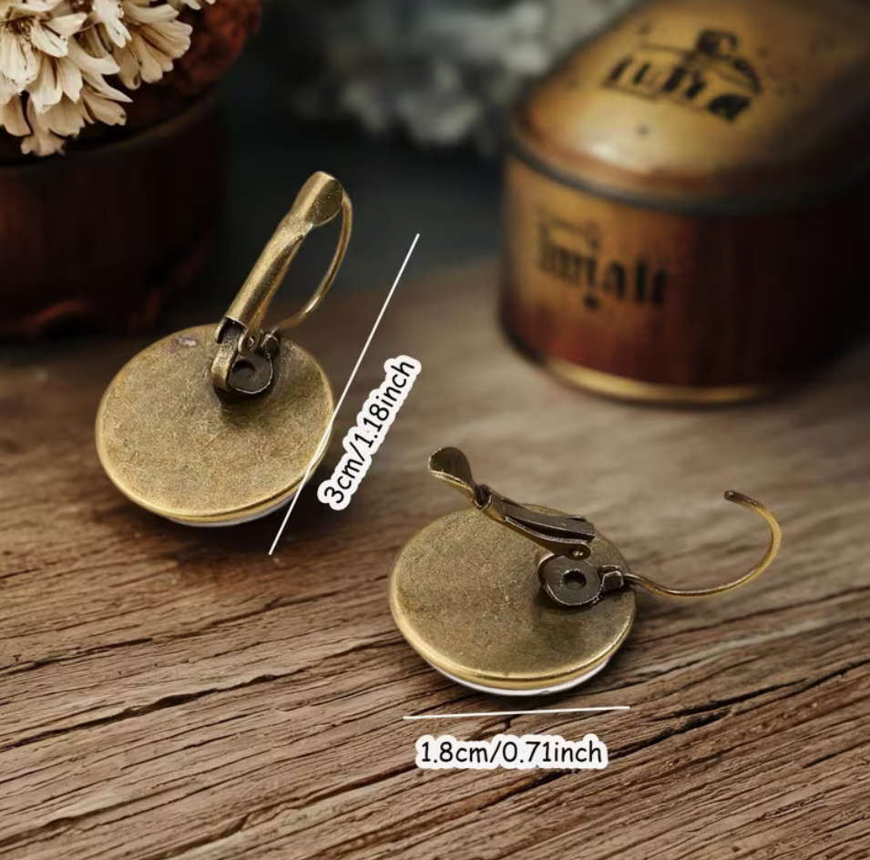 Antique gold-tone round glass dangle earrings with leverback closures and size measurements