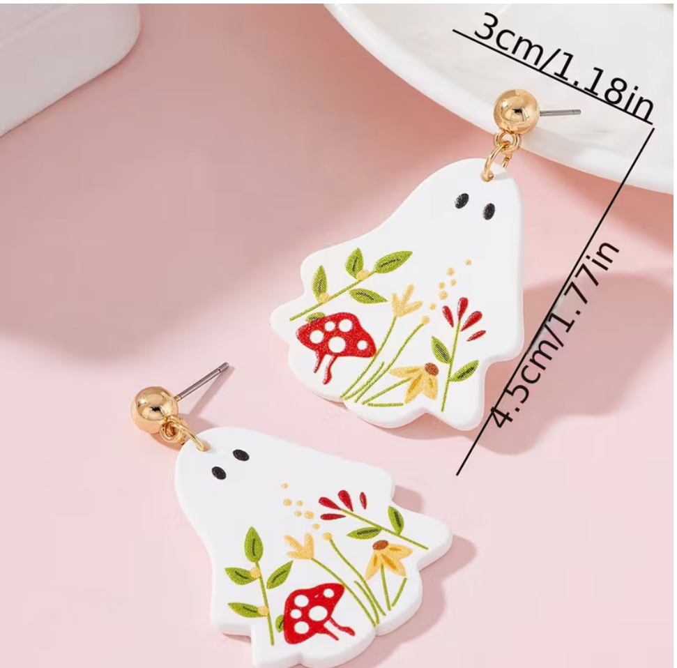 White floral ghost dangle earrings with red mushrooms and wildflowers measuring approximately 1.18 by 1.77 inches.
