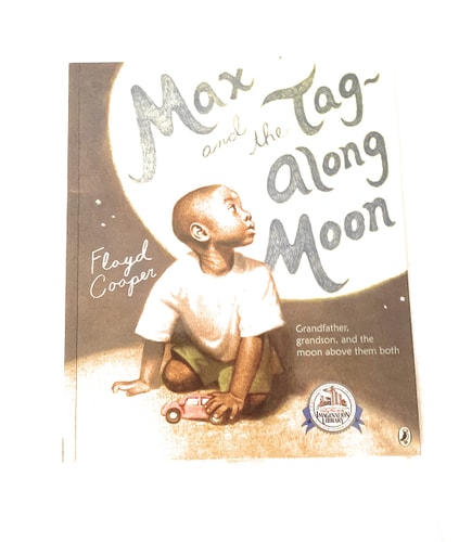 A cover image of the book 'Max and the Tag-along Moon' featuring an illustration of a child looking up at the moon with a sense of wonder.