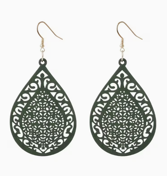 Forest green wooden teardrop dangle earrings featuring intricate hollow filigree cutout patterns and gold-tone fishhook ear wires