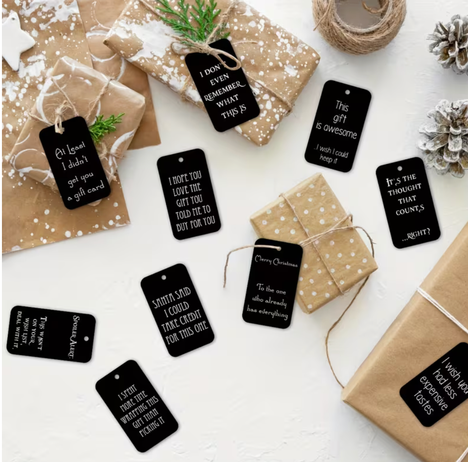 Assortment of funny and sarcastic black Christmas gift tags with white lettering and string