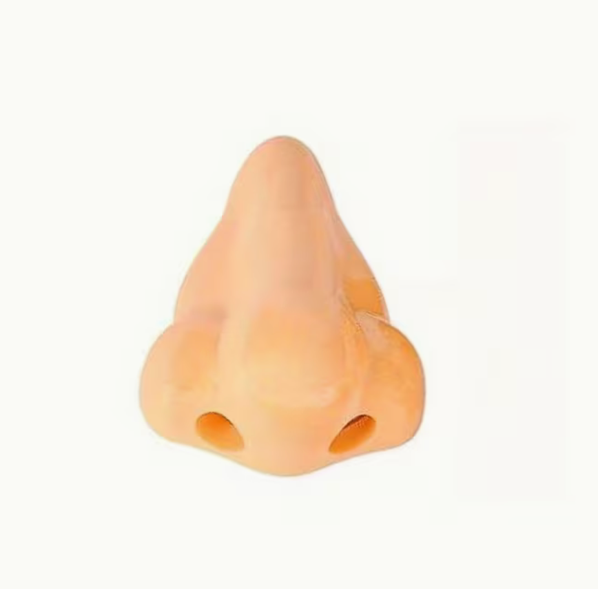 Novelty nose-shaped pencil sharpener designed to sharpen standard pencils while adding a humorous touch to desks, classrooms, and offices.