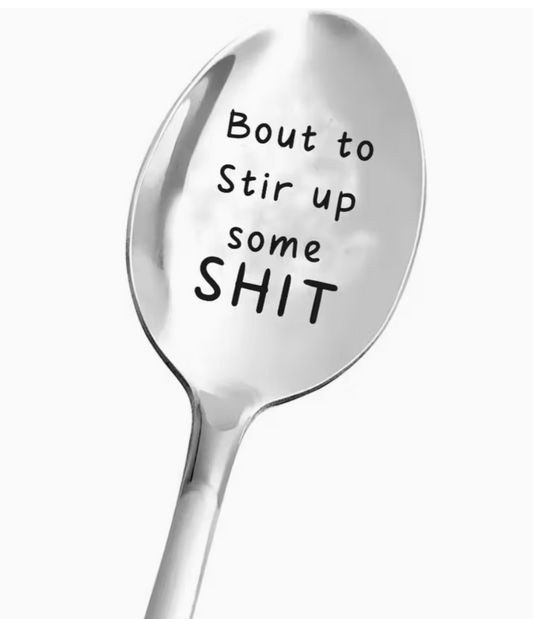stainless steel spoon engraved with the phrase Bout to Stir Up Some Shit