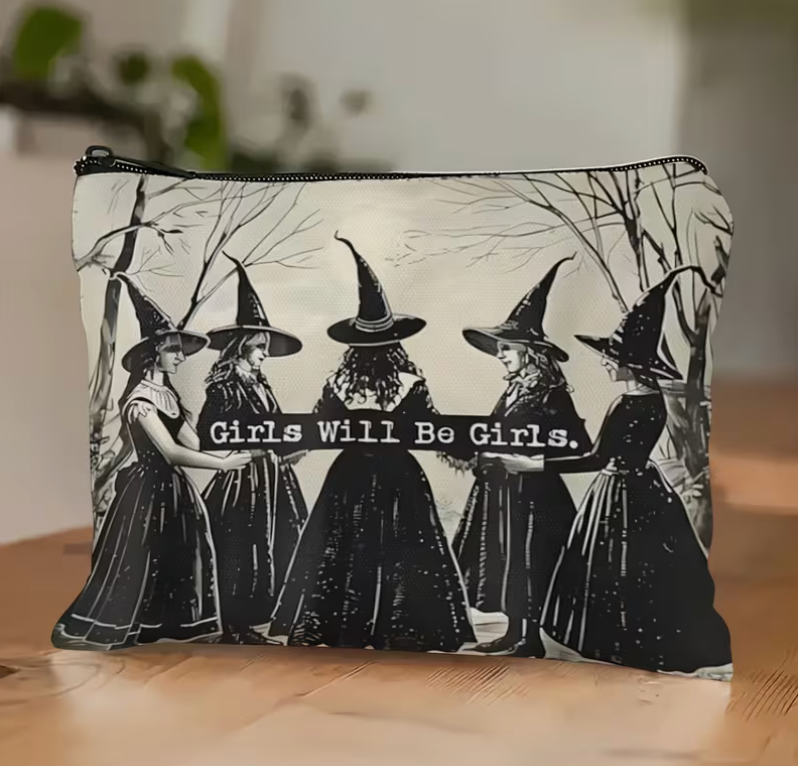 Girls Will Be Girls black and cream zipper pouch featuring five vintage gothic witches holding hands beneath bare tree branches