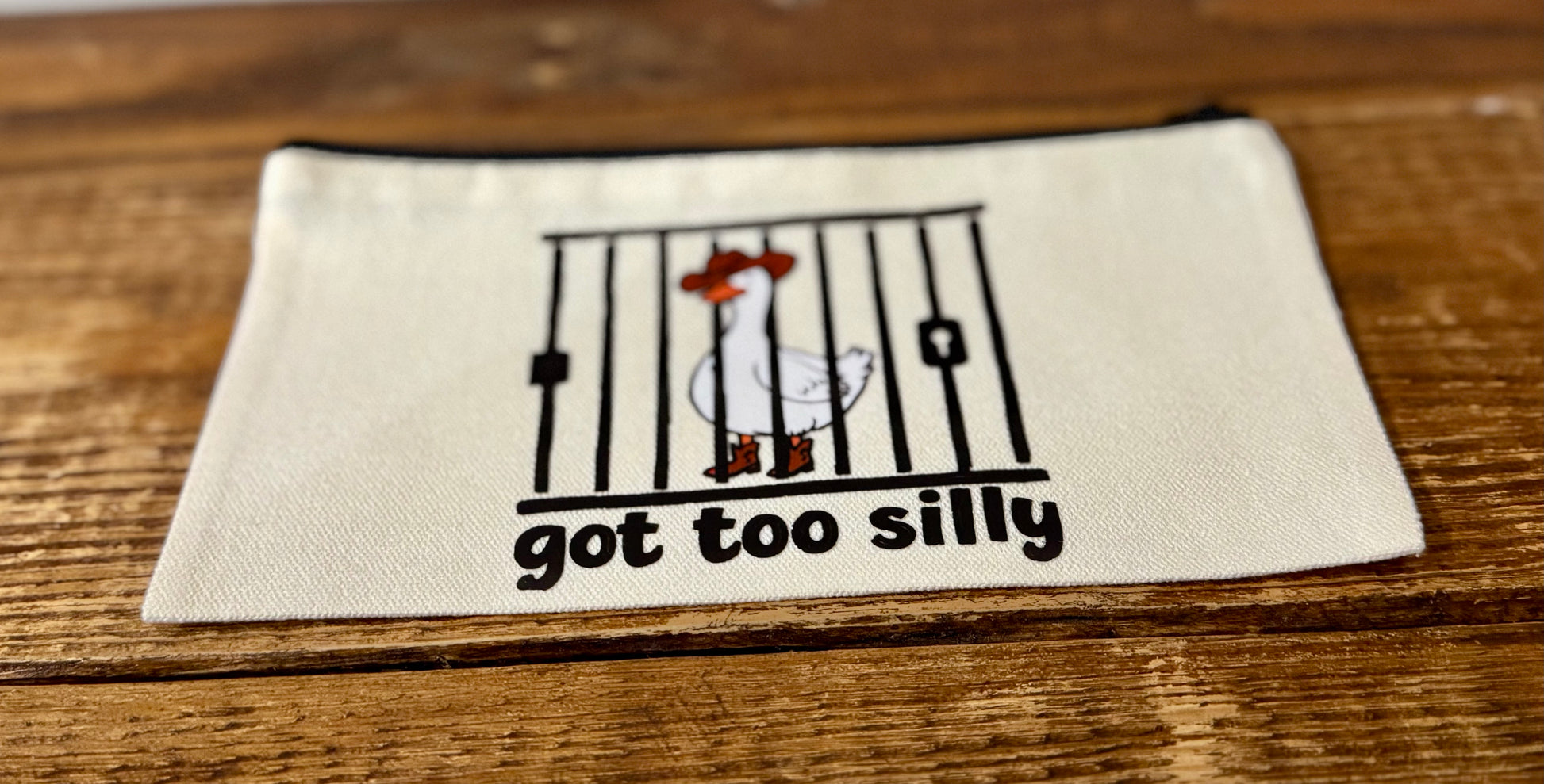 A playful zippered accessories pouch featuring the phrase Got Too Silly, perfect for storing pencils, cosmetics, or small essentials with a fun twist.