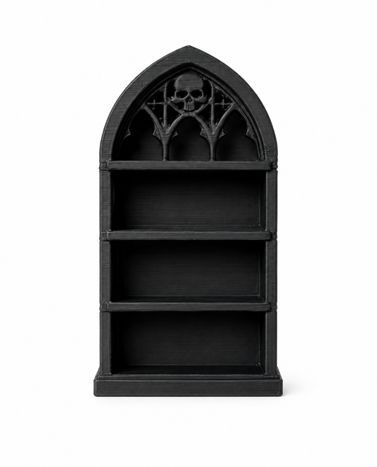 Black Gothic miniature bookshelf with arched skull detail and open shelves for dollhouse books, dark academia décor, miniature scenes, and collectibles.