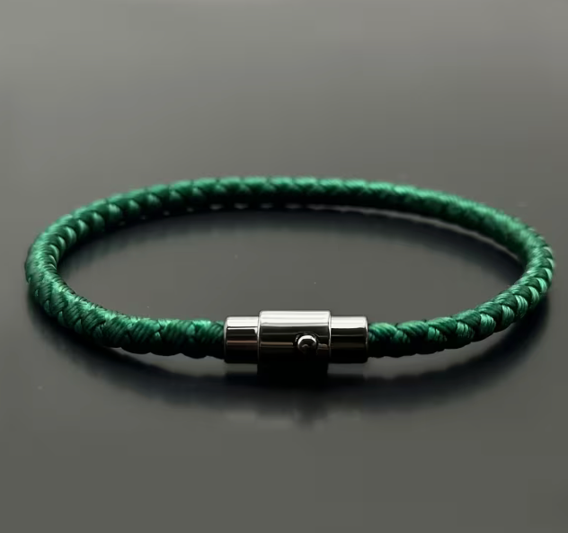 Green braided rope bracelet with clasp displayed on white background
