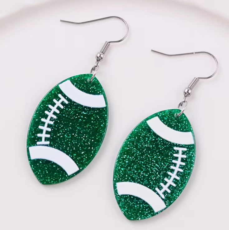 Green glitter football dangle earrings with white football laces and stripes and silver-tone fishhook ear wires, perfect for Leeds Greenwave game days