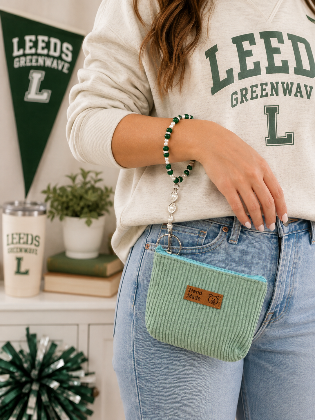 Green and white pearl beaded wristlet with mint pouch styled with green school spirit apparel