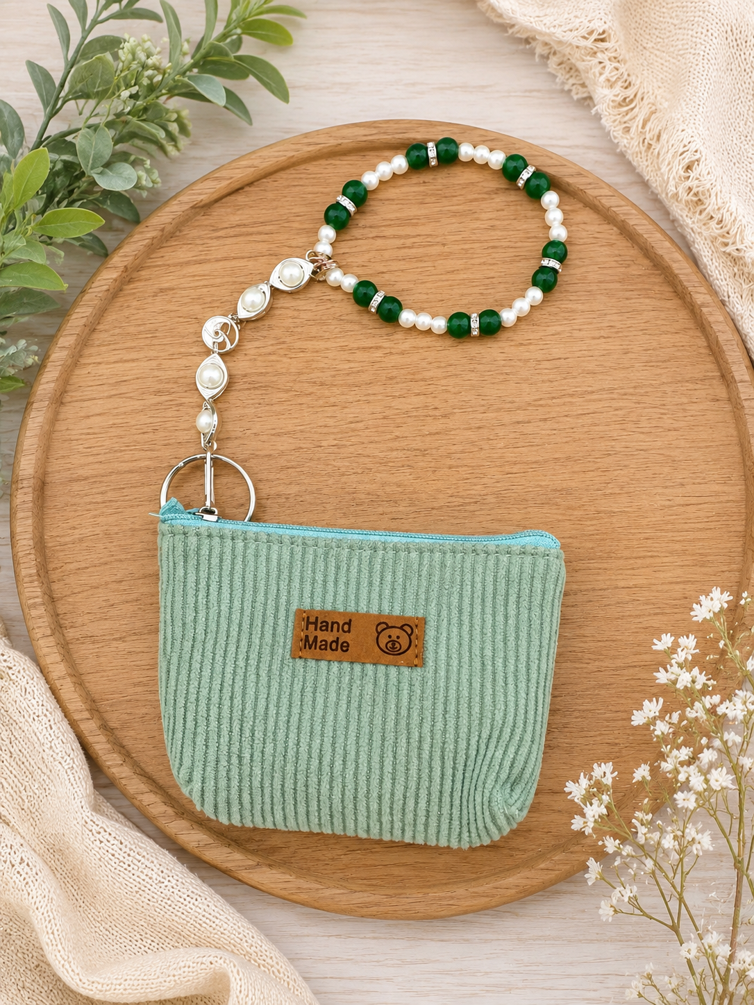 Green and white pearl beaded wristlet keychain with mint green zippered pouch