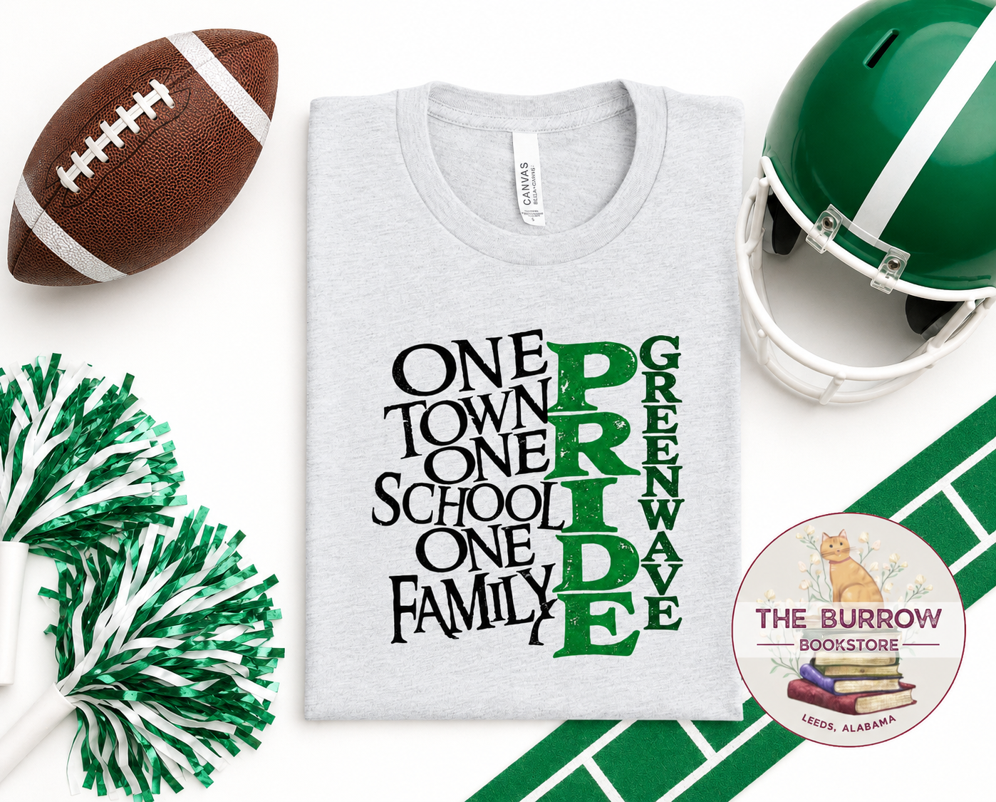 Ash gray Greenwave Pride T-shirt with green and black school spirit design styled with football gear