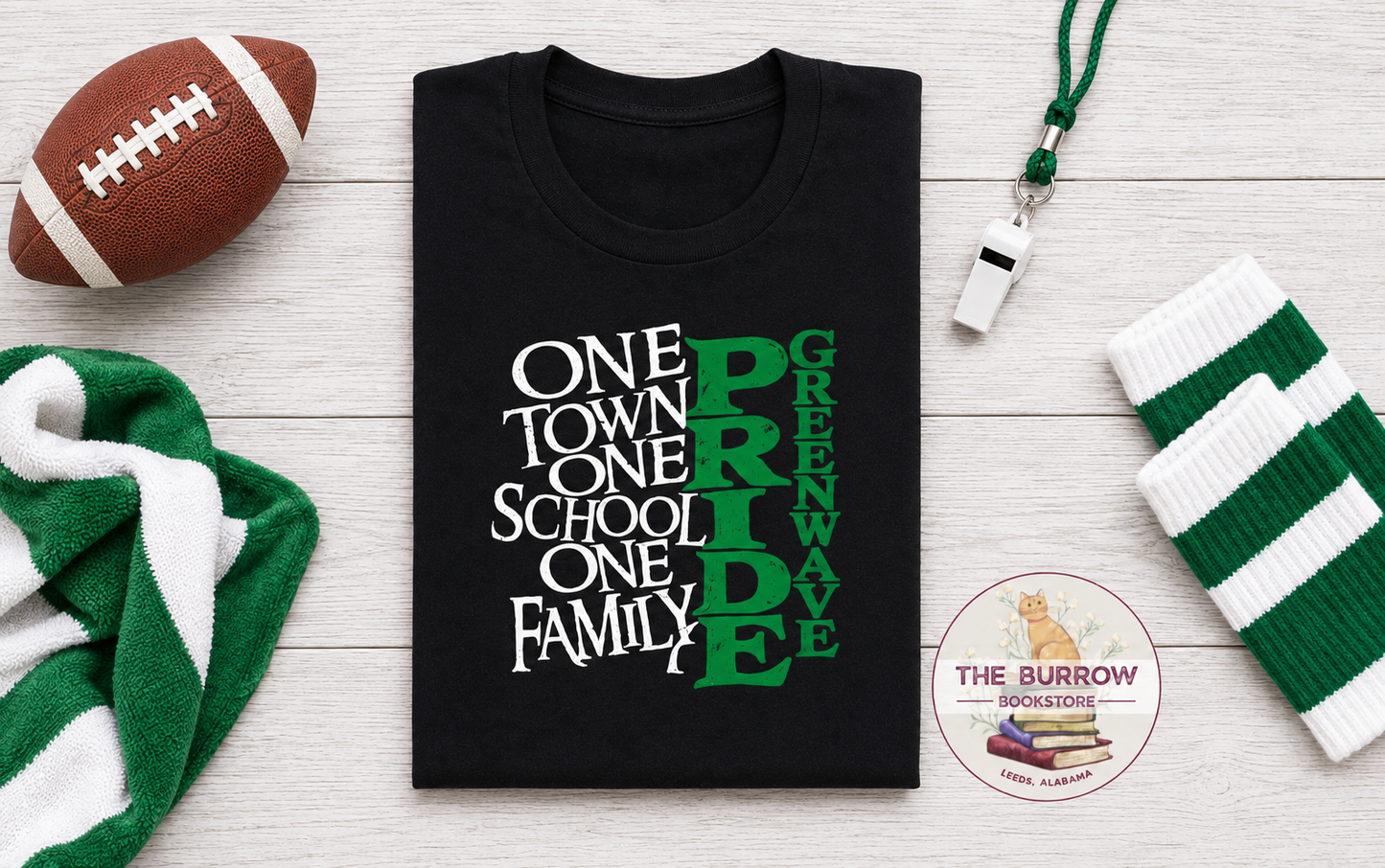 Black Greenwave Pride T-shirt featuring One Town One School One Family design in green and white