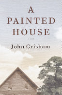 Cover of A Painted House by John Grisham, depicting a rural farmhouse set against a vast cotton field under a clear blue sky.
