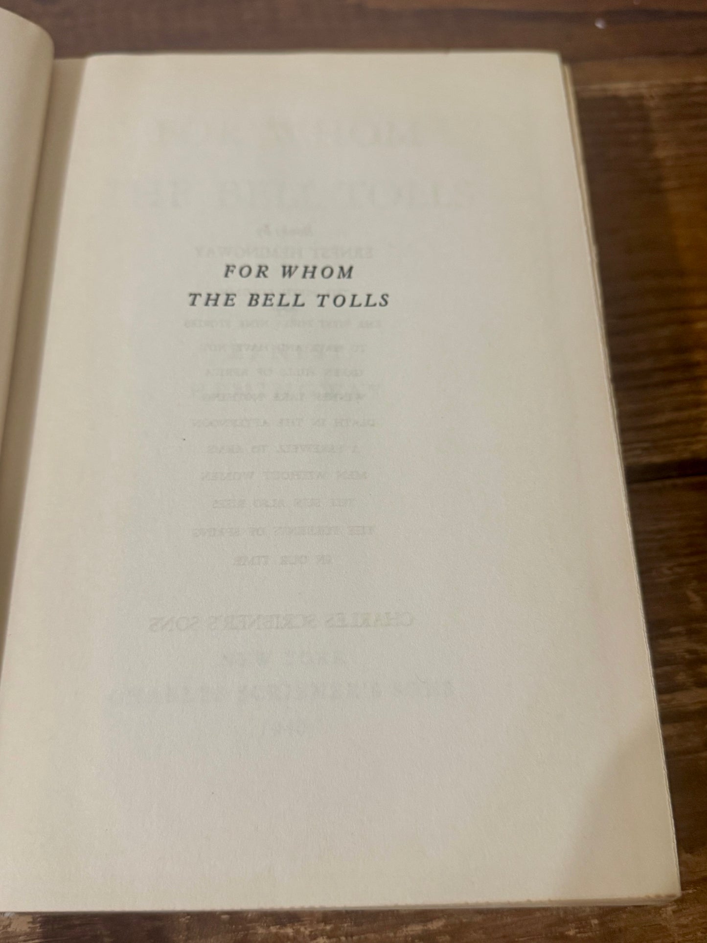 Cover of For Whom the Bell Tolls by Ernest Hemingway, 1940 vintage edition, featuring a classic design with bold typography and a landscape illustration.