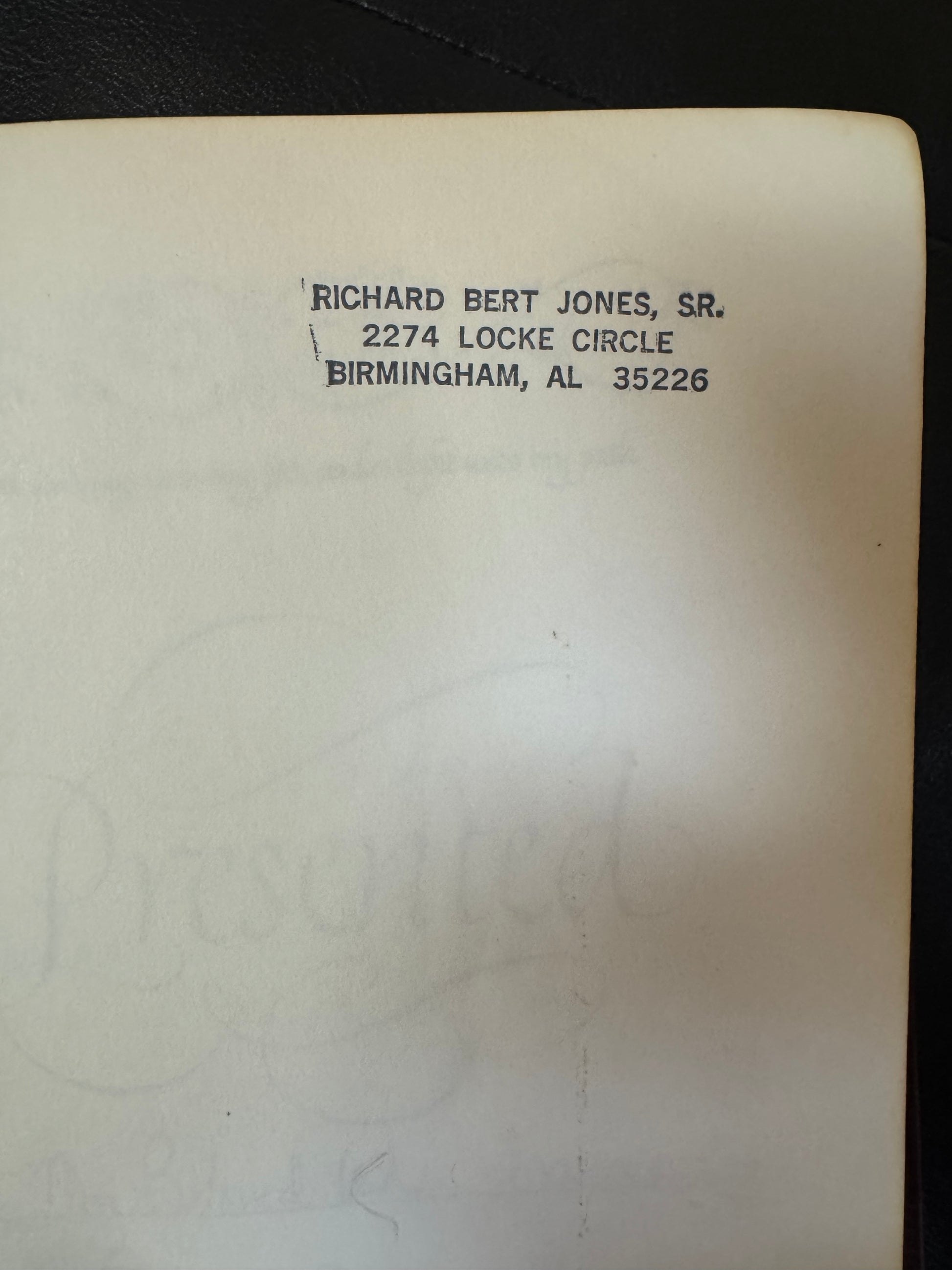 Address printed on a white card with black text