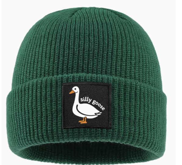 Forest green ribbed knit winter beanie with folded cuff and black Silly Goose patch featuring a white cartoon goose