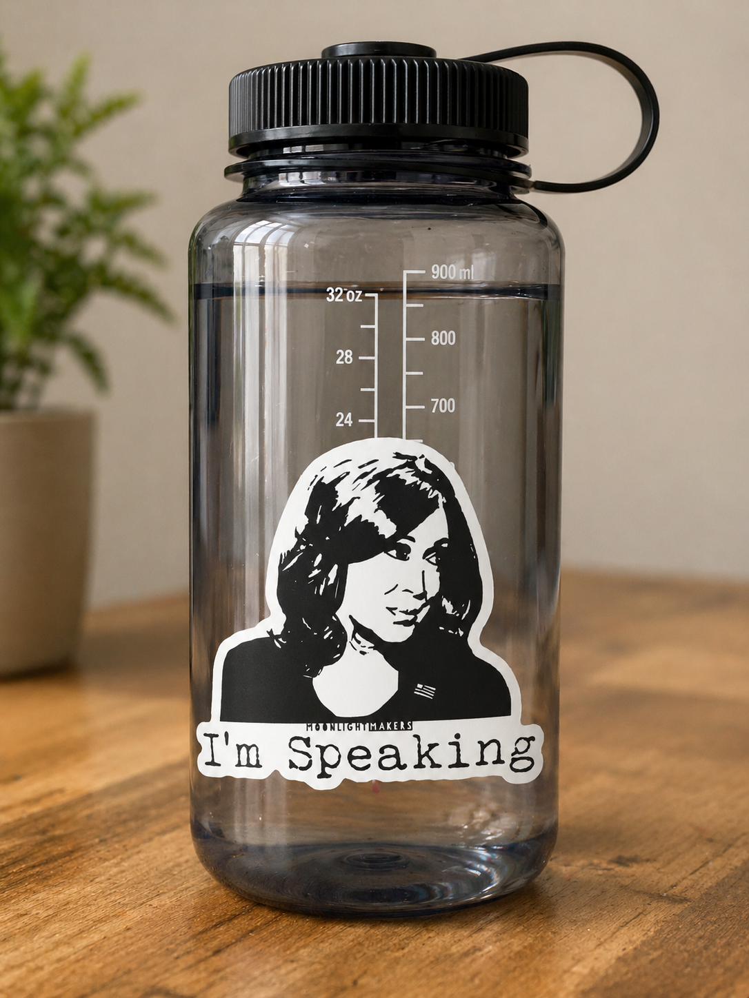 Black and white I'm Speaking vinyl sticker displayed on a reusable water bottle.
