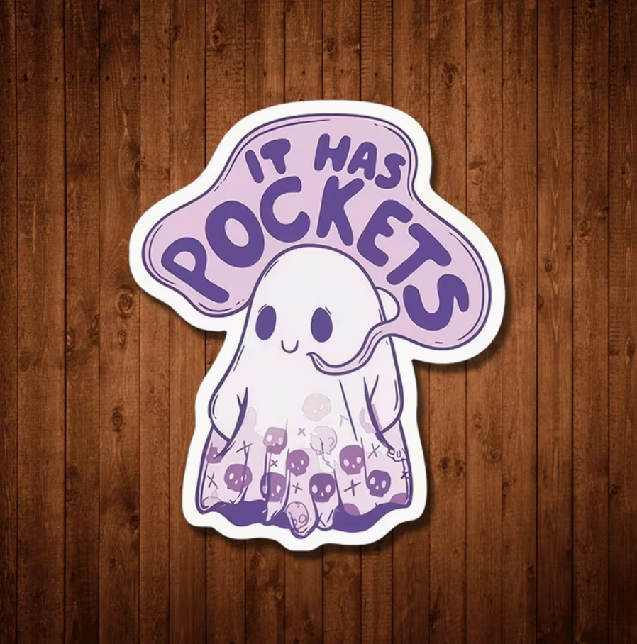 It Has Pockets ghost sticker in purple and white displayed against a wood background
