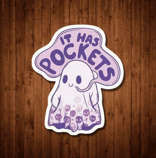 It Has Pockets ghost sticker in purple and white displayed against a wood background