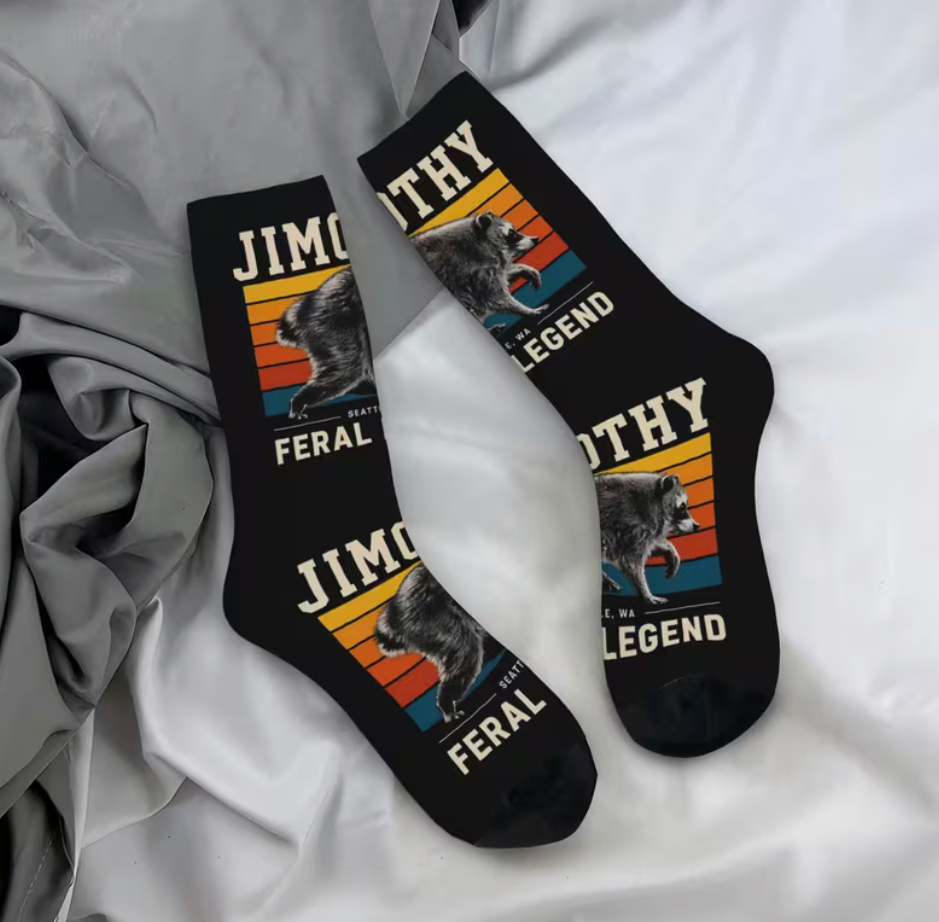 Black Jimothy raccoon Feral Legend crew socks with retro striped design