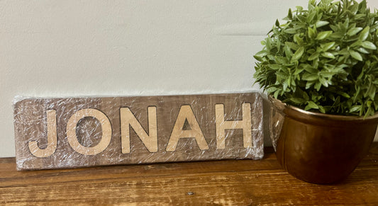 Custom wooden name puzzle personalized with the name Jonah, perfect for kids, handmade and educational.