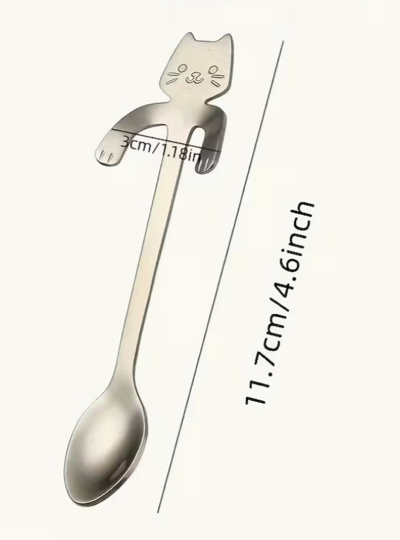 Stainless steel cat spoon with measurement showing 11.7 cm length and 3 cm cat detail width.