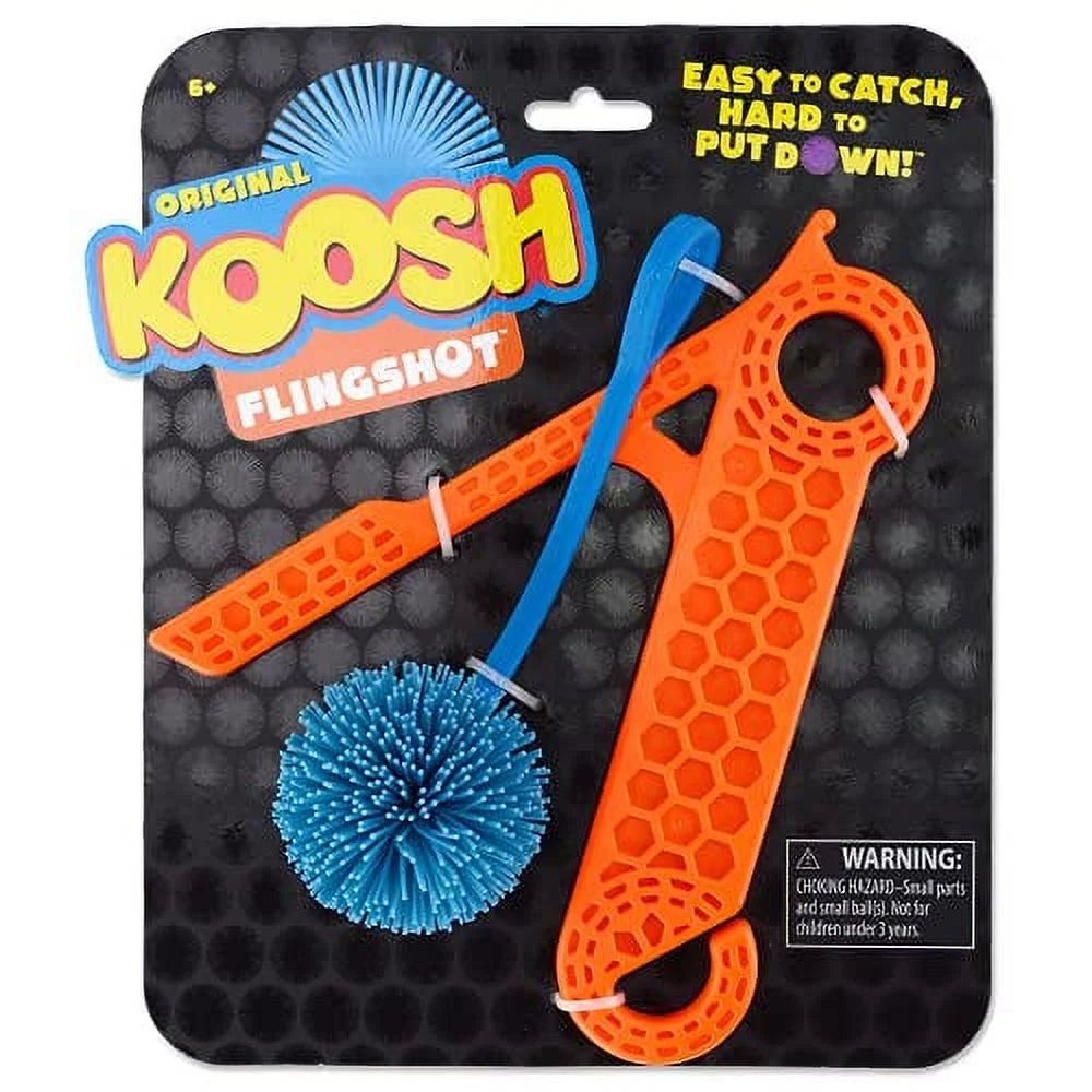 Koosh Flingshot toy set with orange flingshot and blue ball on a black packaging background