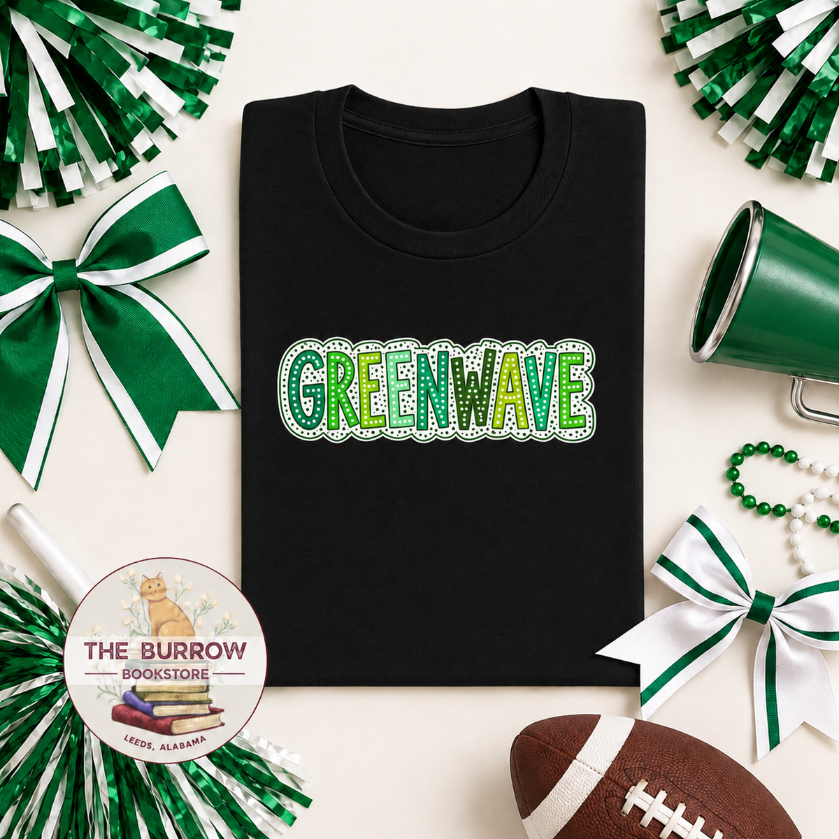 Black Leeds Greenwave spirit shirt featuring green and white retro Greenwave lettering