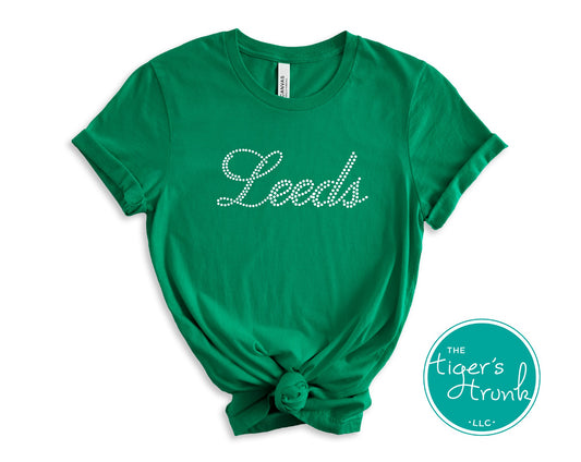 Green t-shirt with 'Leeds' text on a white background, featuring The Tiger's Throats logo.