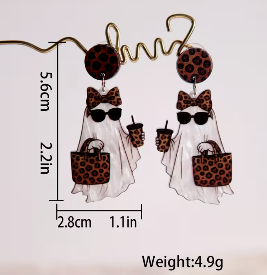 Leopard print ghost Halloween acrylic earrings measuring approximately 2.2 inches long and 1.1 inches wide.