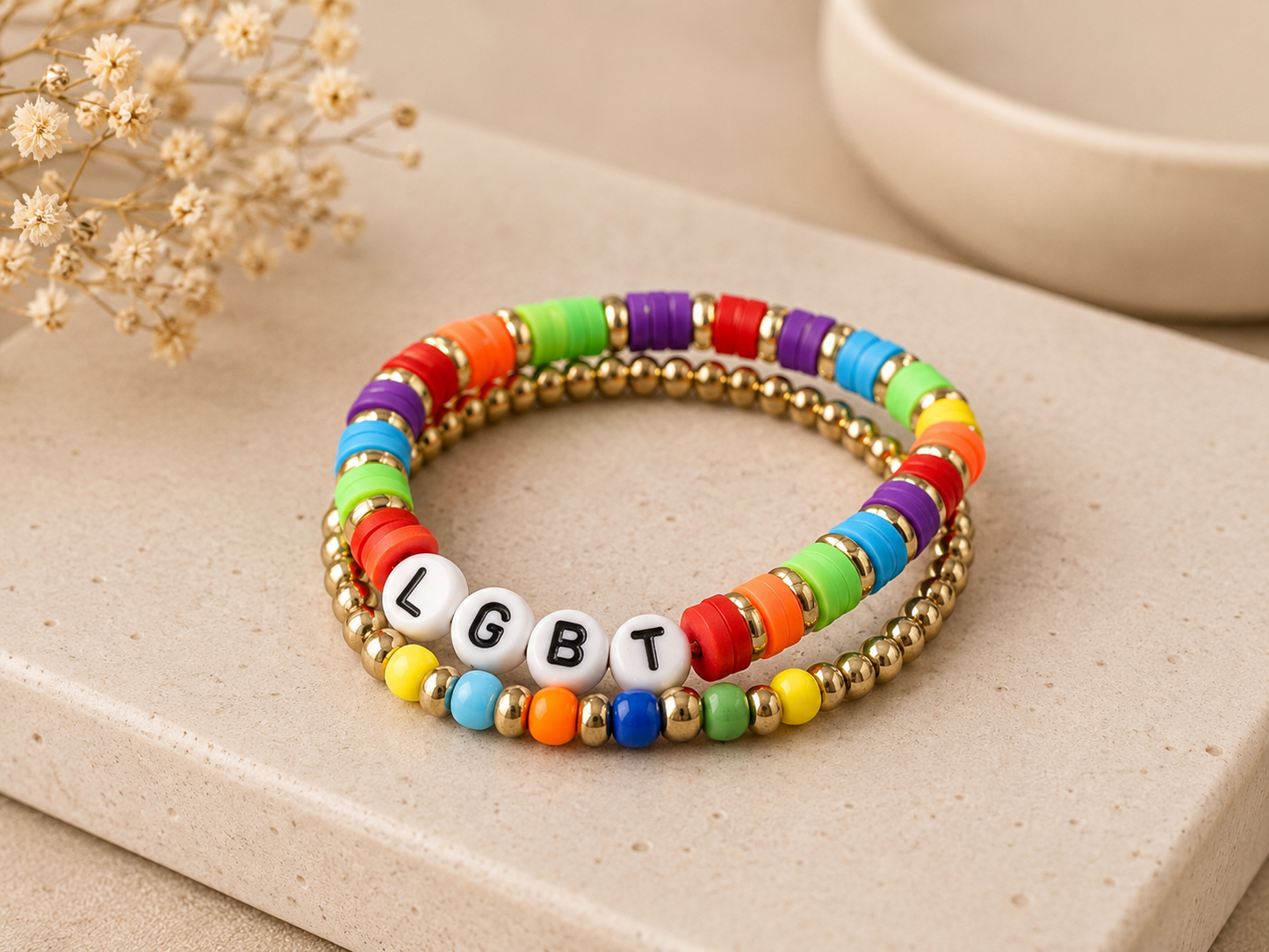 LGBTQ rainbow stretch bracelet set with colorful beads and white letter charms