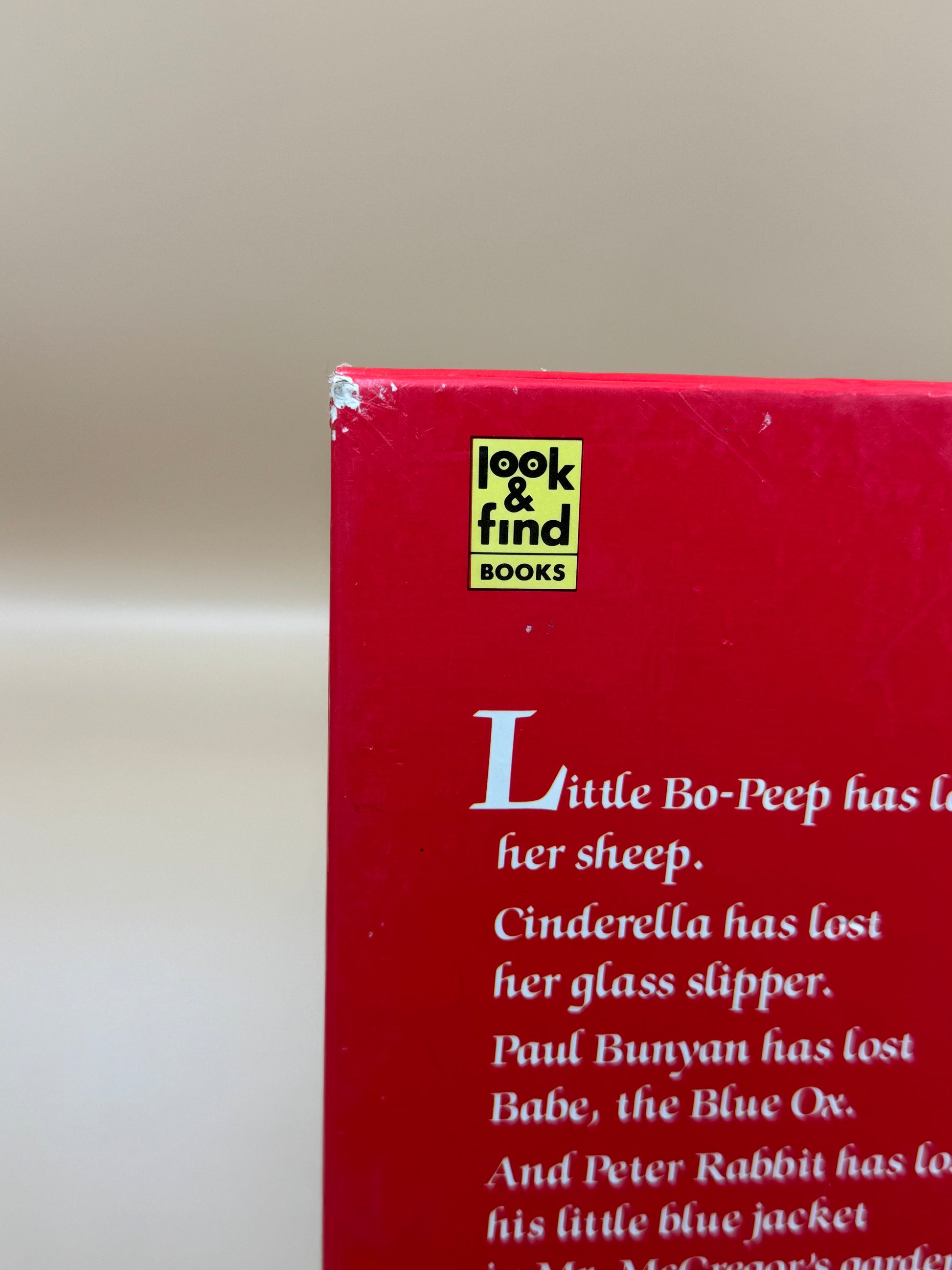 Red book cover with 'Look & Find Books' logo and text about famous stories.