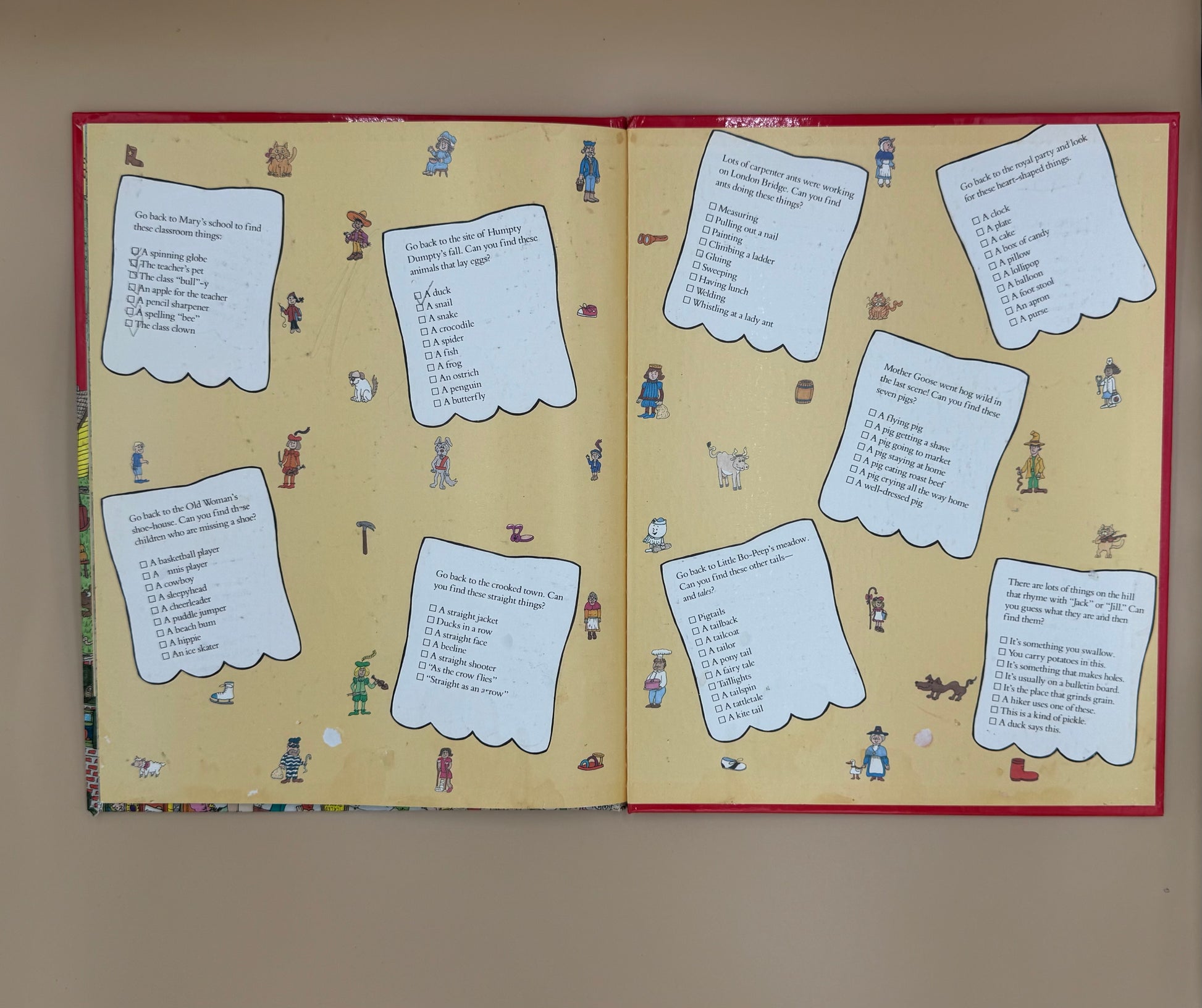 Open book with text and illustrations on a beige background
