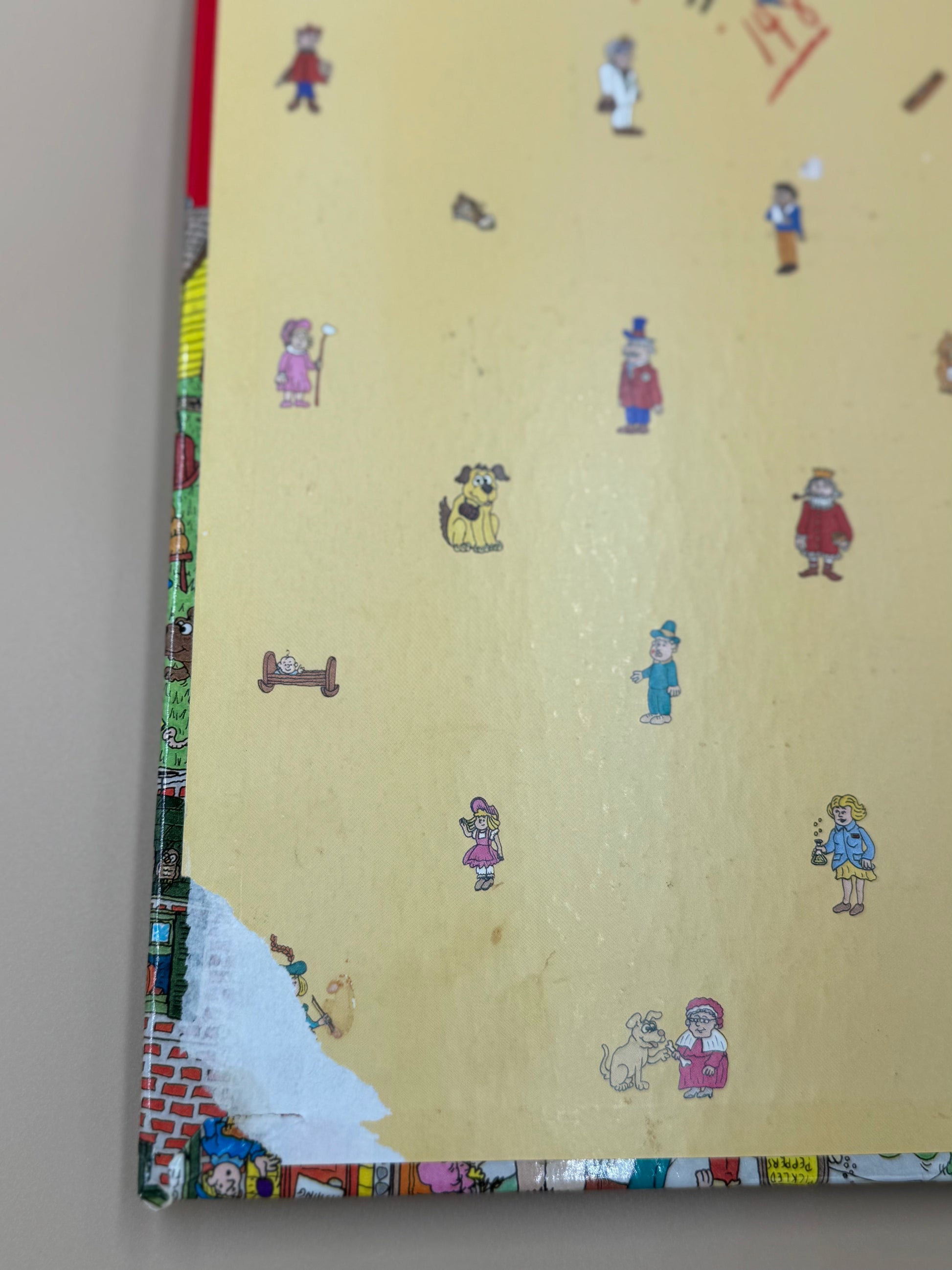Children's book with cartoon characters on a beige background