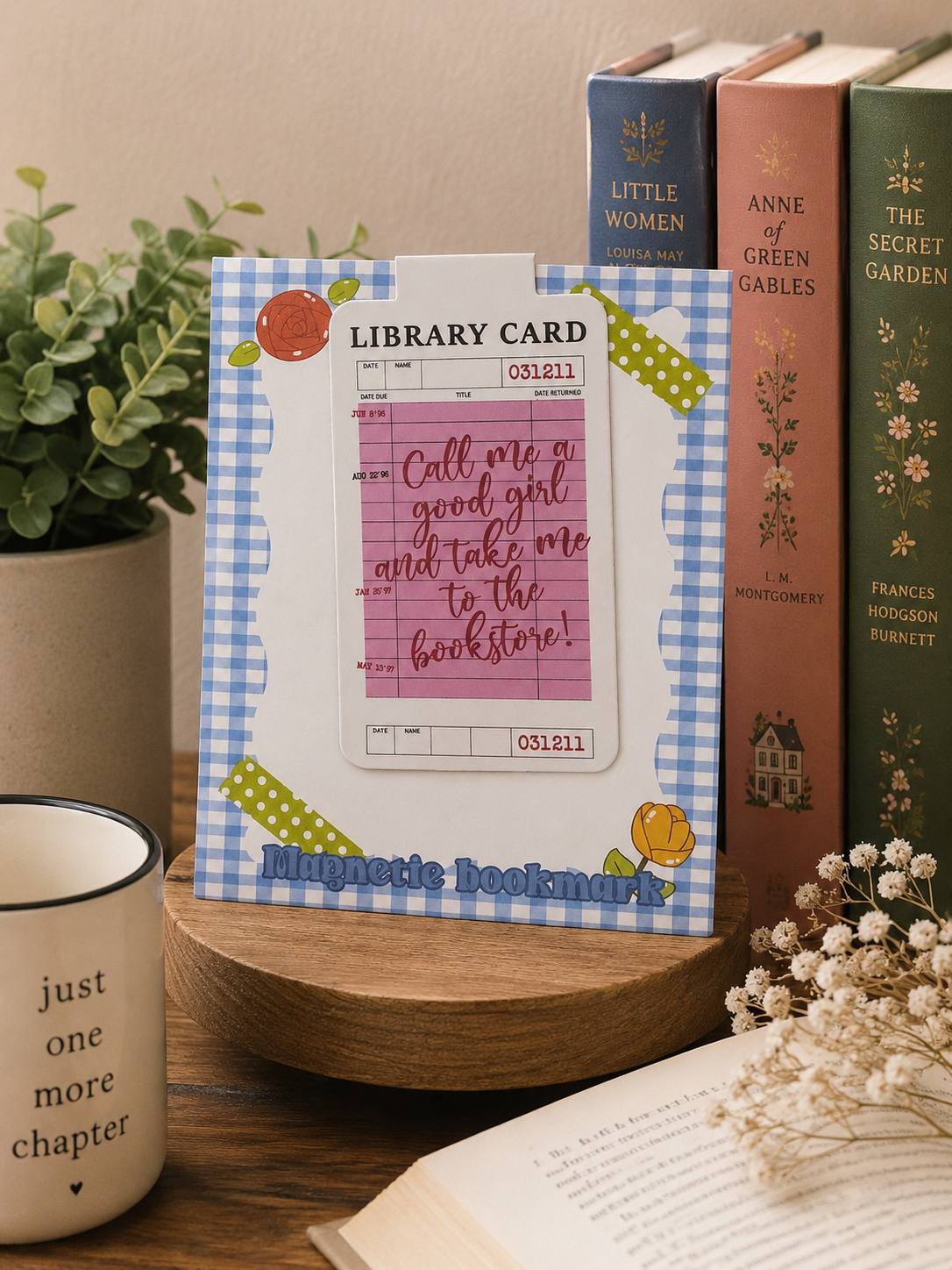 Magnetic library card bookmark reading "Call Me a Good Girl and Take Me to the Bookstore."