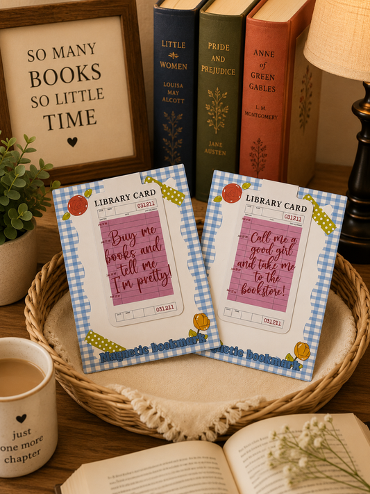 Two magnetic library card bookmarks displayed together in a cozy bookish setting.