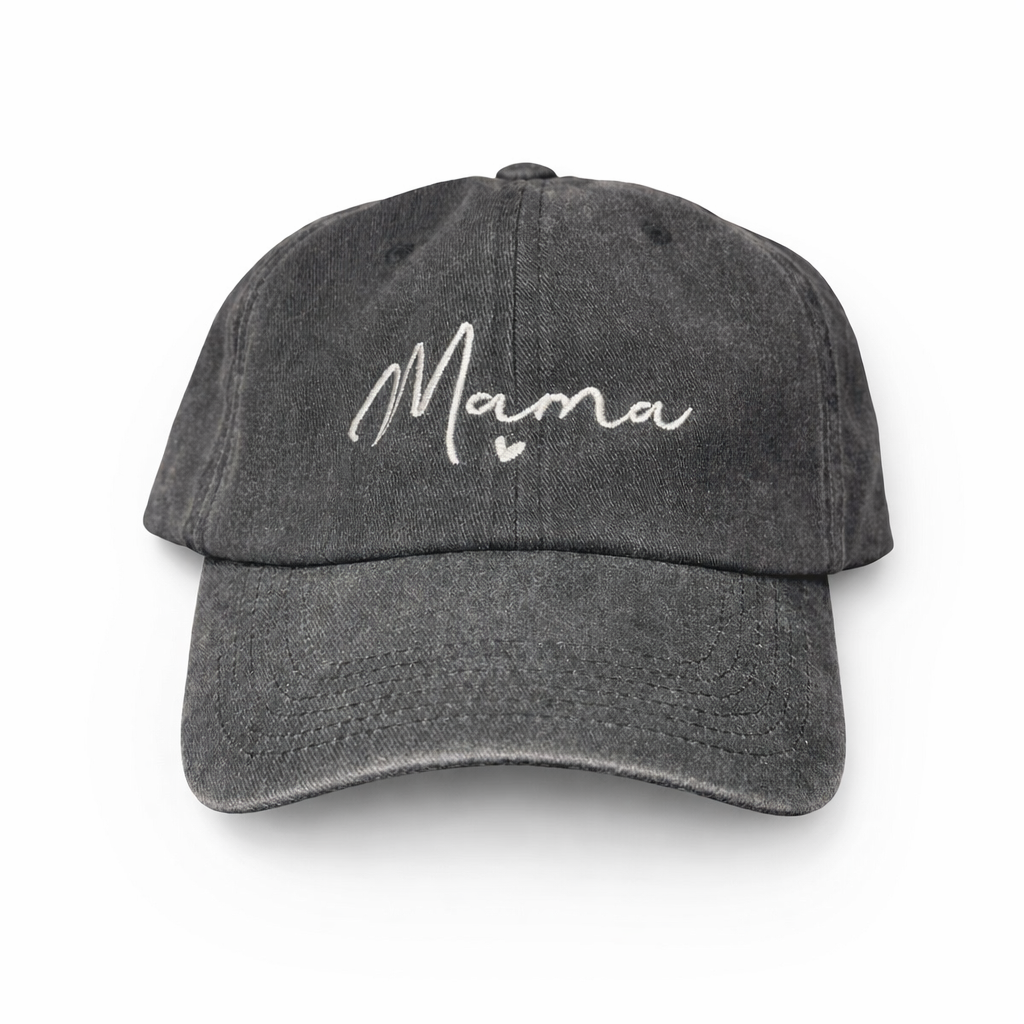 Black cap with 'Mama' and a heart embroidered on a white background