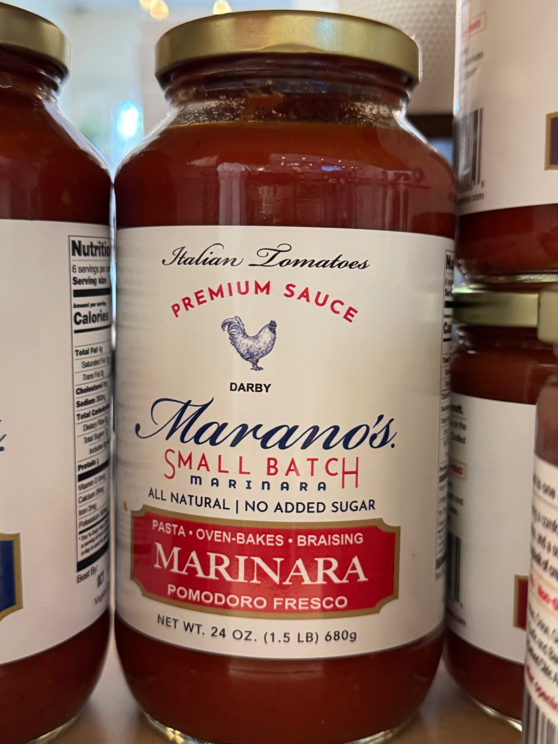 Jar of Marano's Small Batch Marinara sauce with a visible label.