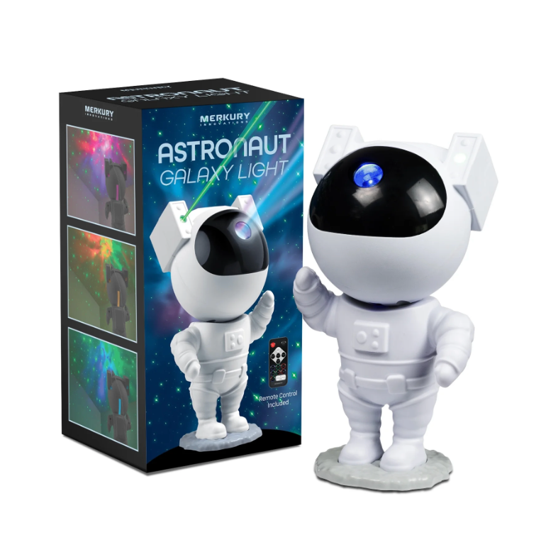 Merkury astronaut galaxy light projector with remote control, white astronaut night light standing beside retail box for kids room and space themed decor