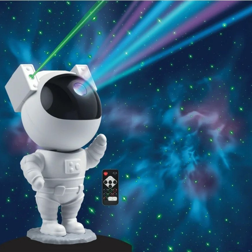 Merkury astronaut galaxy light projector displaying colorful nebula and green star lights, with remote control shown, ideal for kids bedroom or space themed room decor