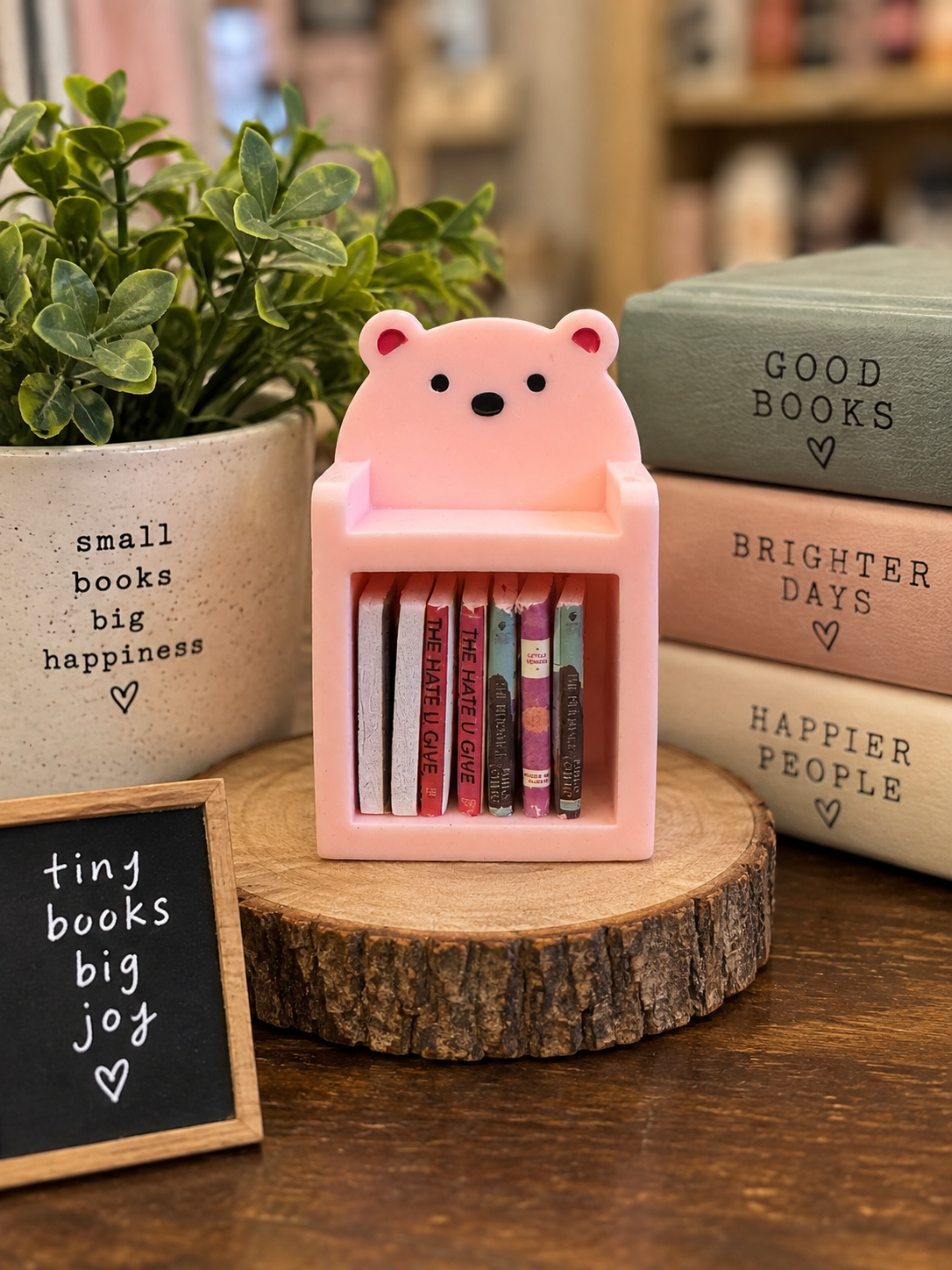 Pink mini bear bookshelf with 10 tiny books, approximately 2 x 1.3 inches
