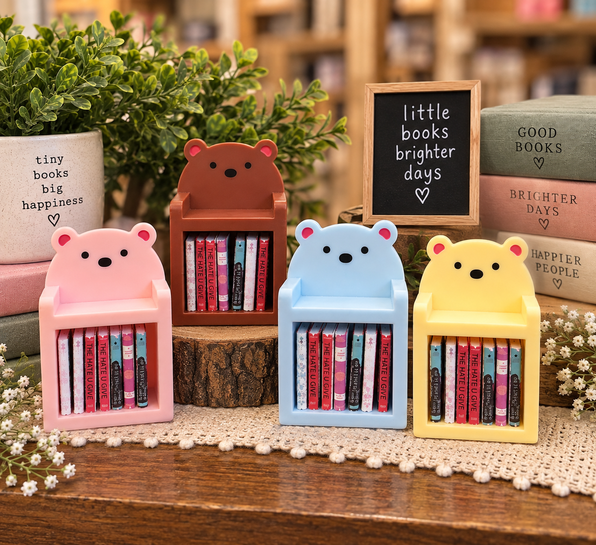 Mini bear bookshelves with tiny books shown in pink, brown, pale blue and yellow color options