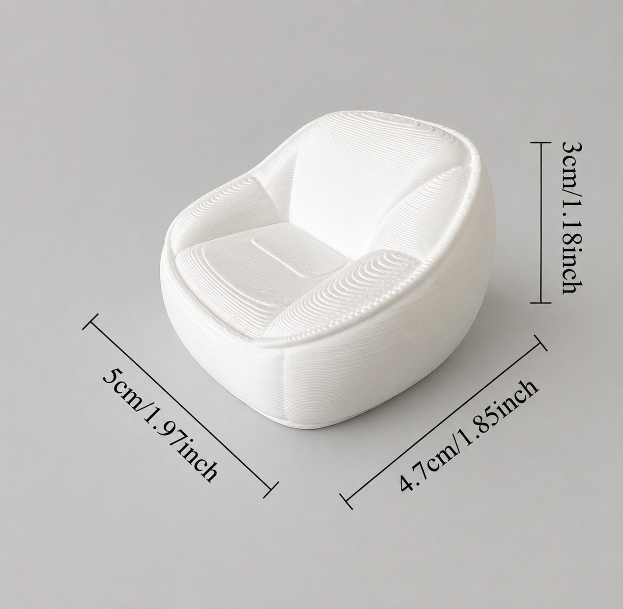 White miniature bean bag style chair for dollhouses, fairy gardens, dioramas, miniature room displays, and photography props.