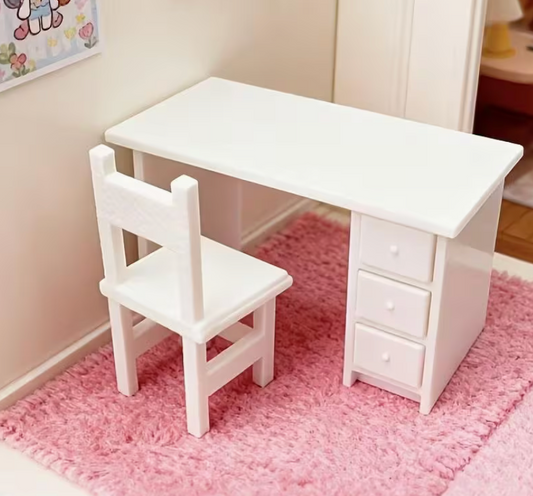Miniature white desk and chair set with three pull-out drawers for dollhouses, dioramas, fairy gardens, and miniature office scenes.