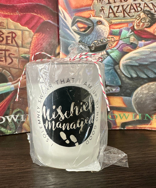 Harry Potter-themed votive candle featuring the phrase Mischief Managed.