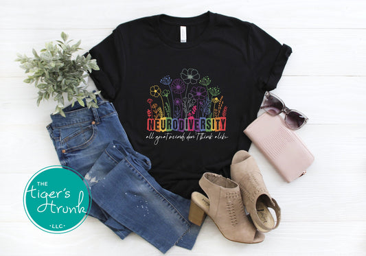 T-shirt with floral elements and the quote "All Great Minds Don’t Think Alike," gift-ready design for neurodivergent pride and mental health support
