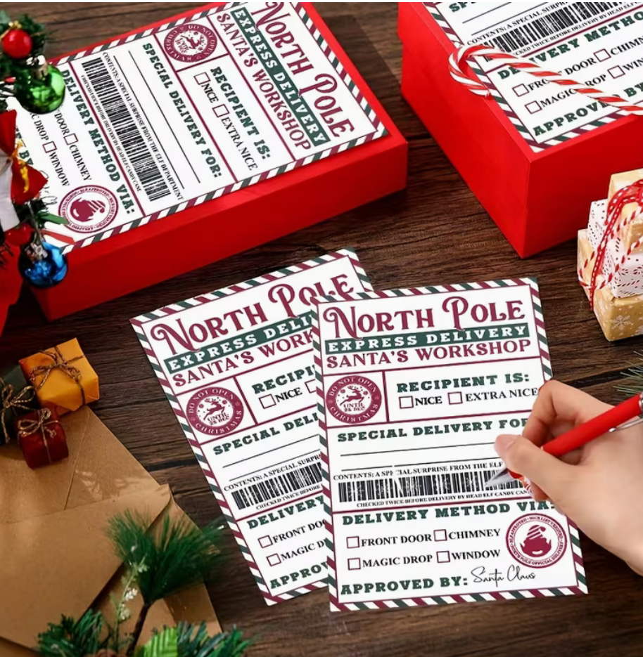 North Pole Delivery gift labels displayed on wrapped Christmas boxes with a person filling in recipient information