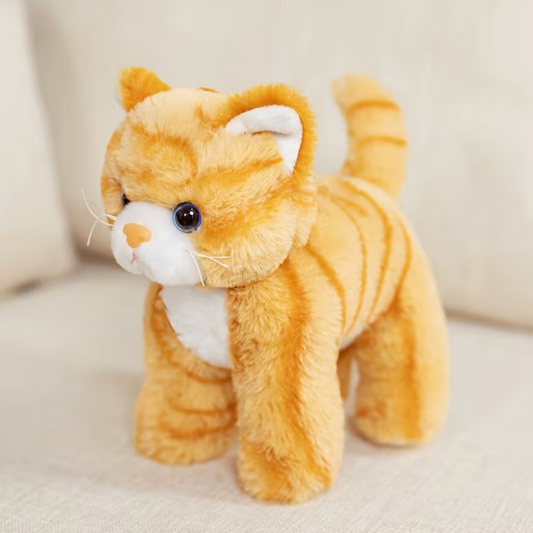 Realistic orange tabby cat plush toy with soft striped fur, white chest, bright eyes, and upright tail, approximately 8 inches tall.