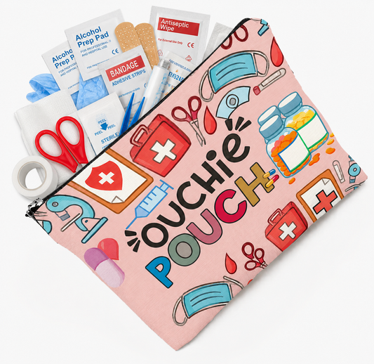 pink medical-themed zipper pouch with Ouchie Pouch text and colorful healthcare supply illustrations including bandages, masks, pills, and first aid items
