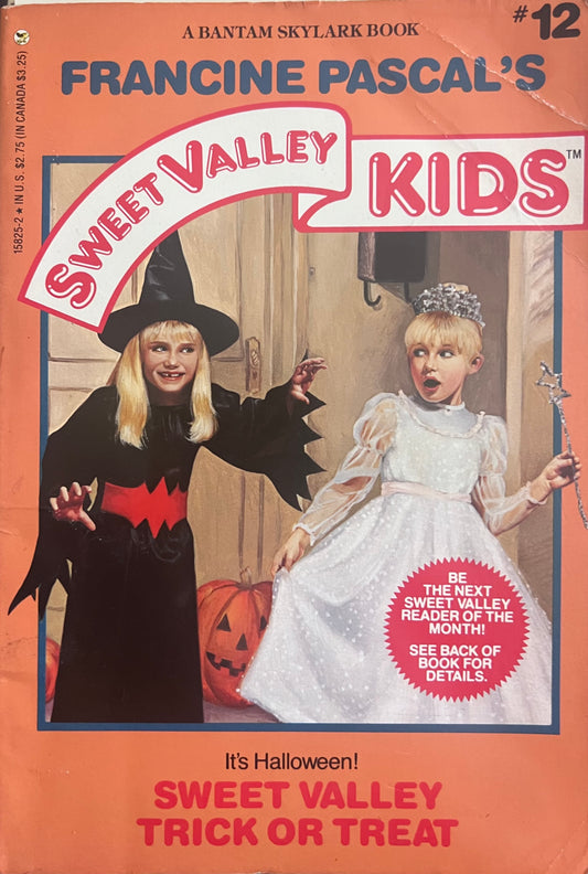 Cover of Sweet Valley Trick or Treat by Francine Pascal (Sweet Valley Kids #12)—twins in Halloween costumes, festive second‑grade school scene